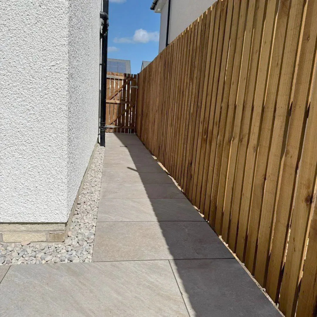 New fencing along a tidy side passage
