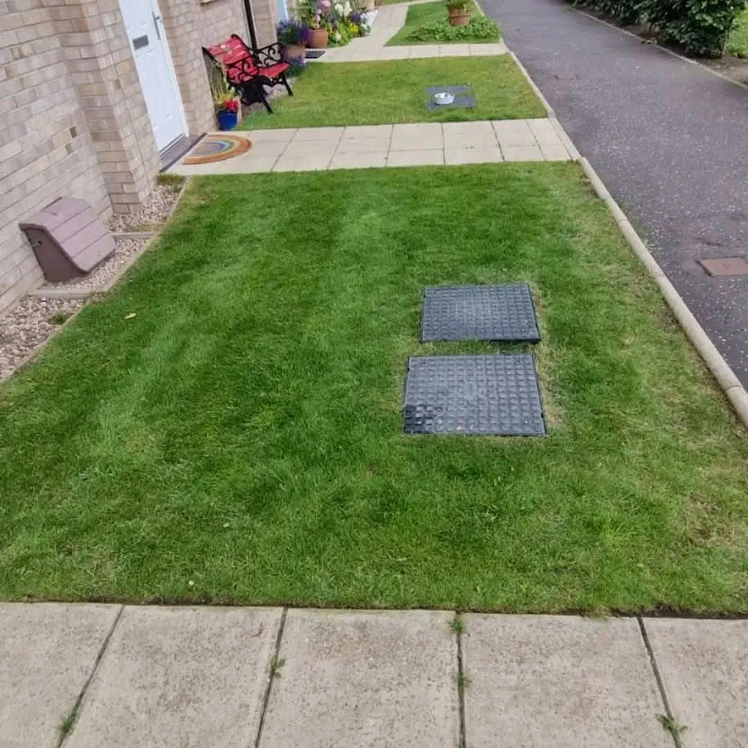 Communal grass area neat and green after maintenance
