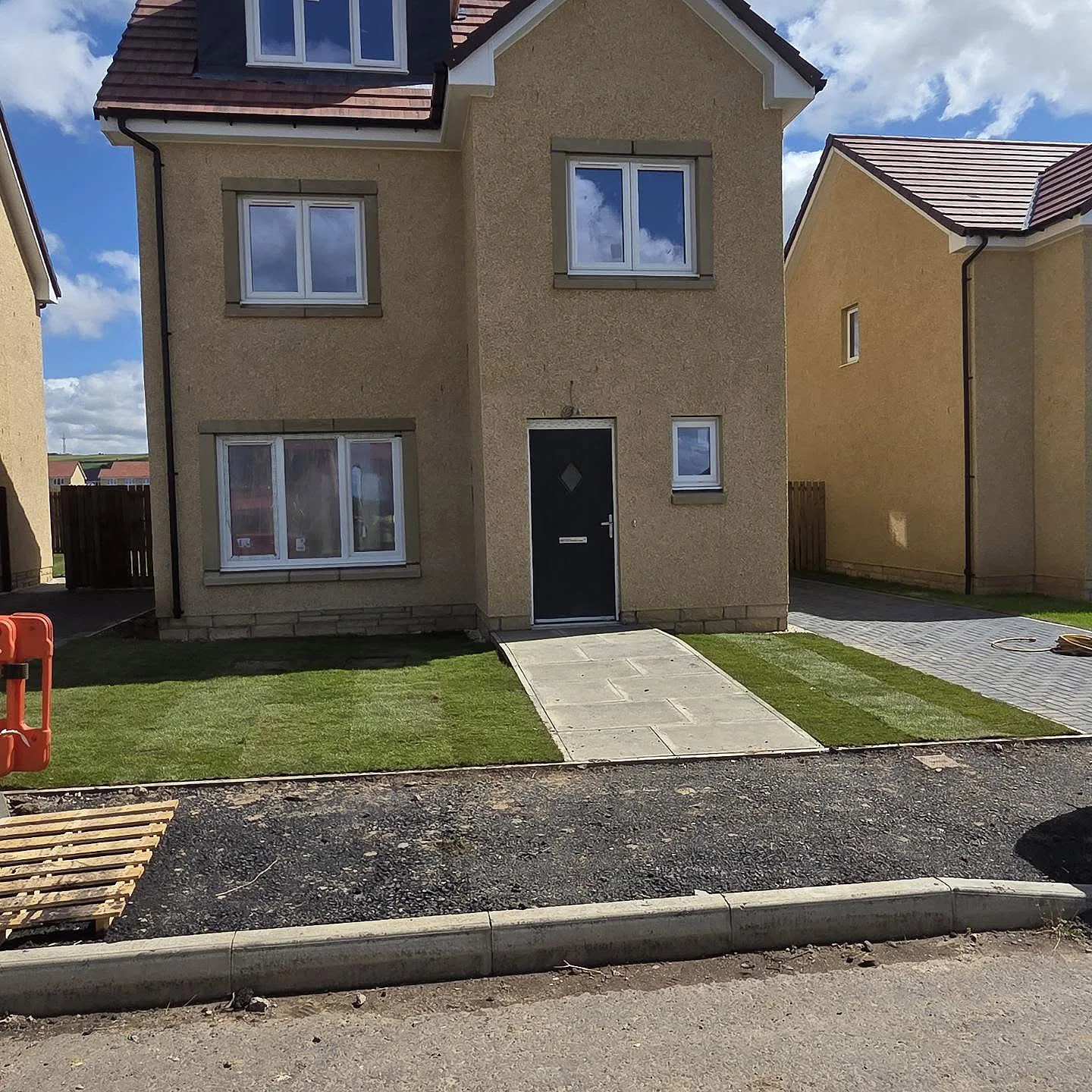 Tidied front garden and new path at a new-build property