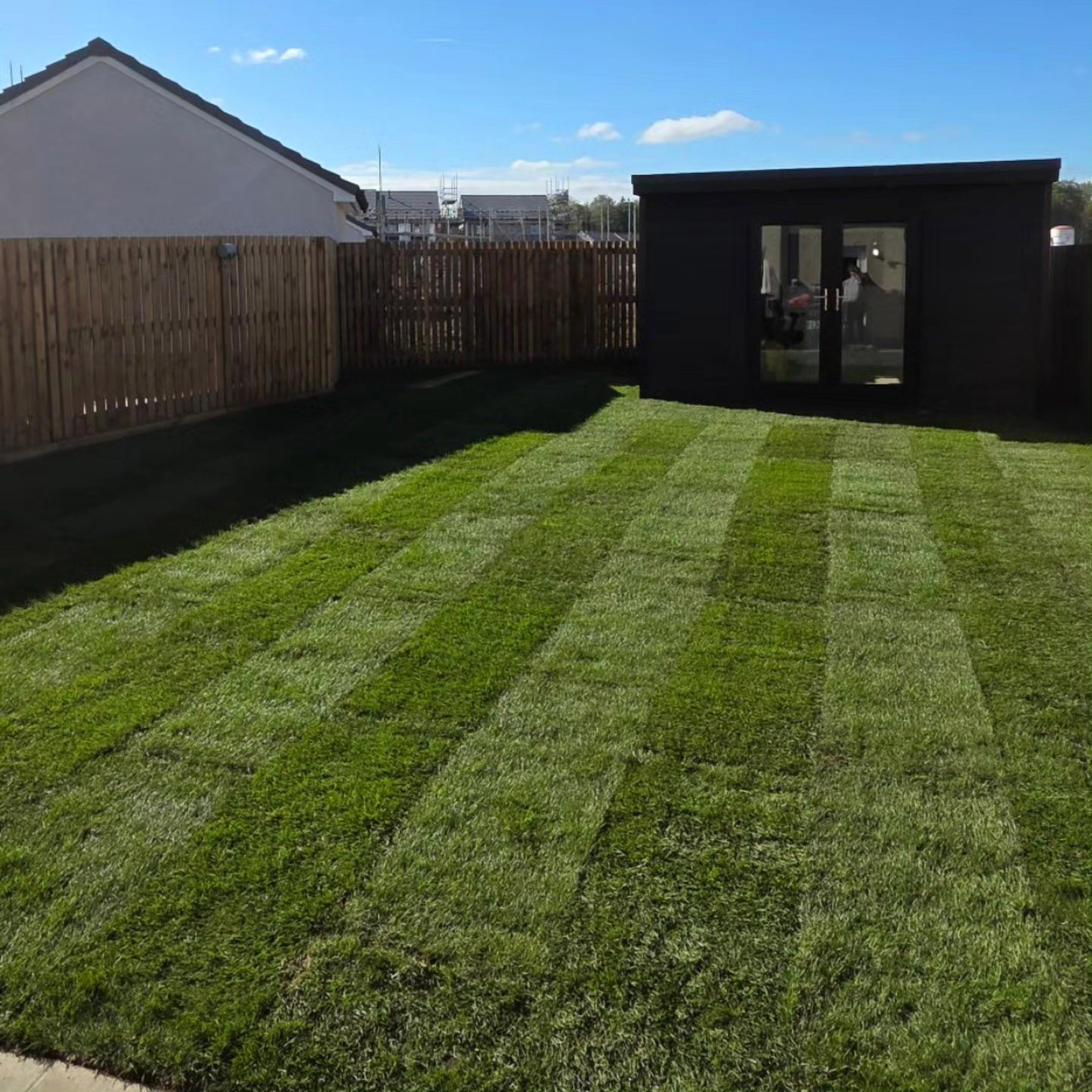 Turfing after: new lawn laid and established