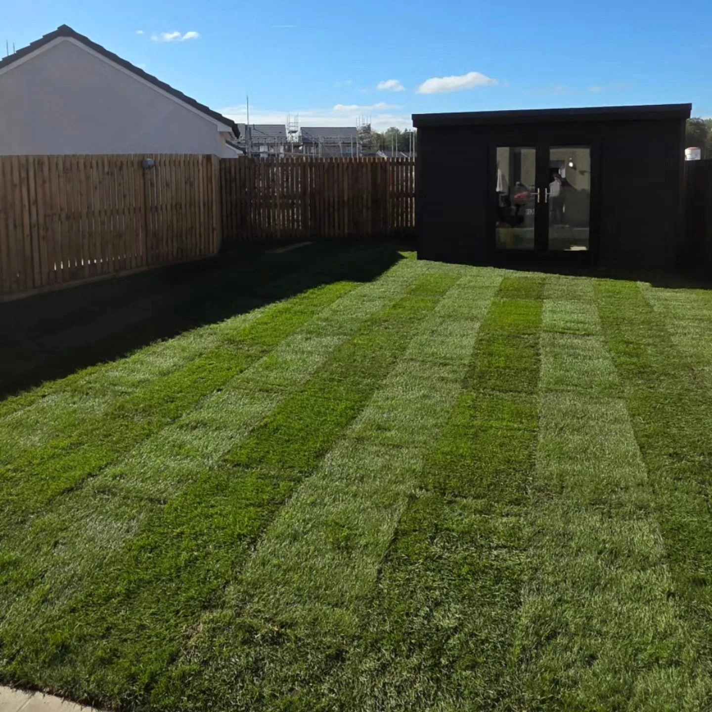 Turfing after: new lawn laid and established